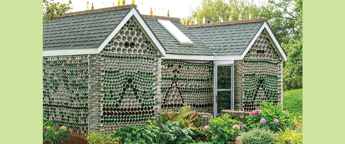 Image of a building made out of old bottles